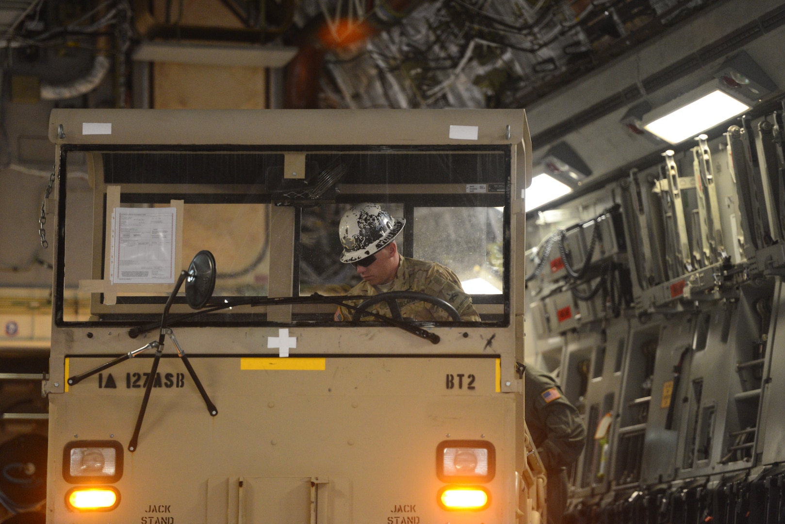 Members from the 502nd Logistics Readiness Squadron, the 433rd Airlift Wing, and the 445th Airlift Wing unload pallets and rolling stock containing maintenance equipment Aug. 30, 2017 at Joint Base San Antonio-Lackland Kelly Field, Texas.