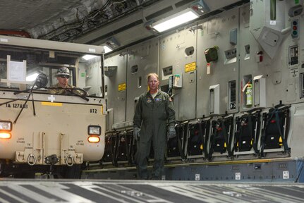 Members from the 502nd Logistics Readiness Squadron, the 433rd Airlift Wing, and the 445th Airlift Wing unload pallets and rolling stock containing maintenance equipment Aug. 30, 2017 at Joint Base San Antonio-Lackland Kelly Field, Texas.
