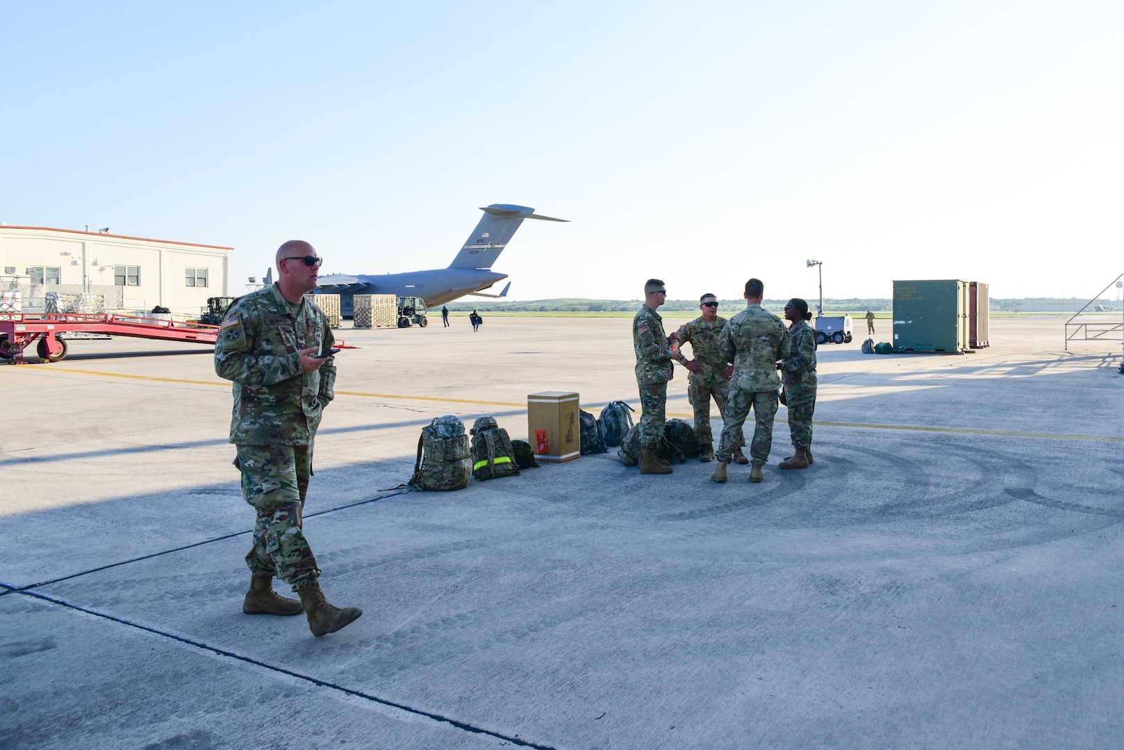 Members from the 502nd Logistics Readiness Squadron, the 433rd Airlift Wing, and the 445th Airlift Wing unload pallets and rolling stock containing maintenance equipment Aug. 30, 2017 at Joint Base San Antonio-Lackland Kelly Field, Texas.