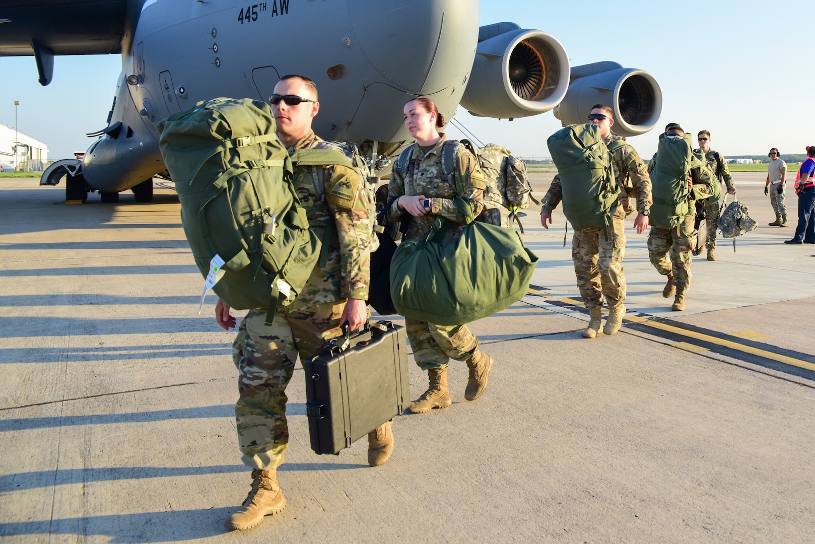 Members from the 502nd Logistics Readiness Squadron, the 433rd Airlift Wing, and the 445th Airlift Wing unload pallets and rolling stock containing maintenance equipment Aug. 30, 2017 at Joint Base San Antonio-Lackland Kelly Field, Texas.