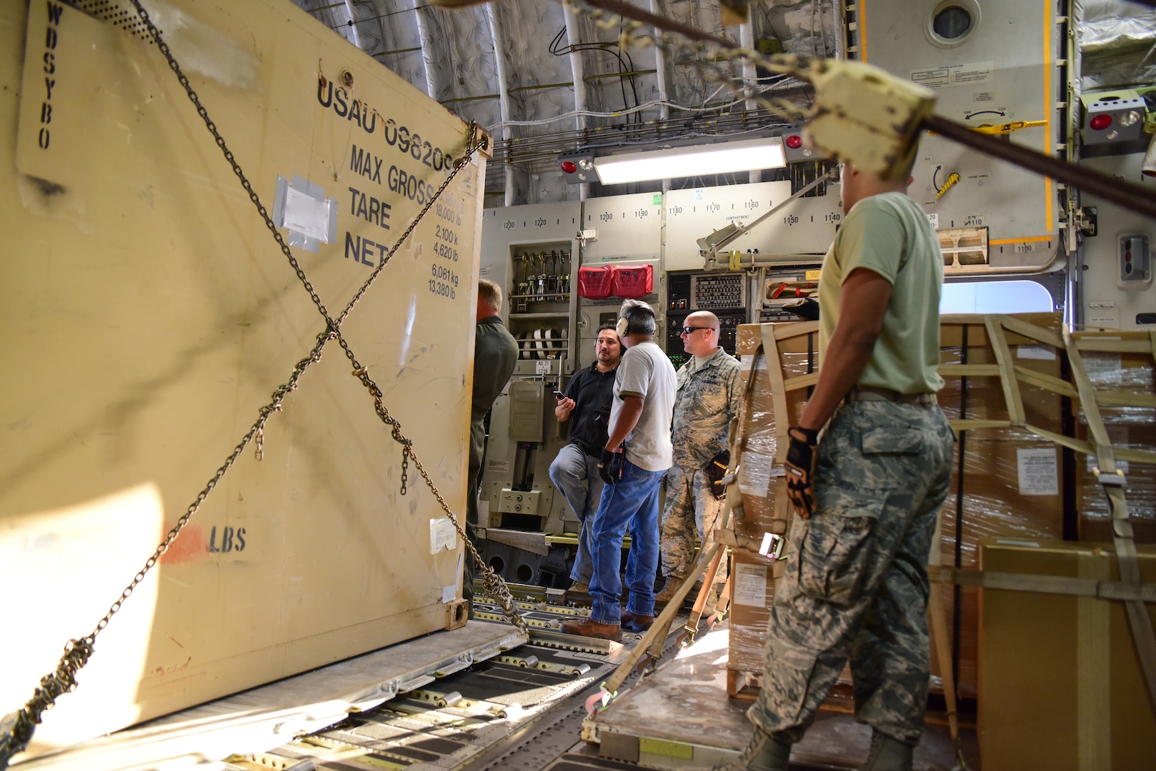 Members from the 502nd Logistics Readiness Squadron, the 433rd Airlift Wing, and the 445th Airlift Wing unload pallets and rolling stock containing maintenance equipment Aug. 30, 2017 at Joint Base San Antonio-Lackland Kelly Field, Texas.