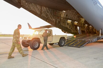 Members from the 502nd Logistics Readiness Squadron, the 433rd Airlift Wing, and the 445th Airlift Wing unload pallets and rolling stock containing maintenance equipment Aug. 30, 2017 at Joint Base San Antonio-Lackland Kelly Field, Texas.