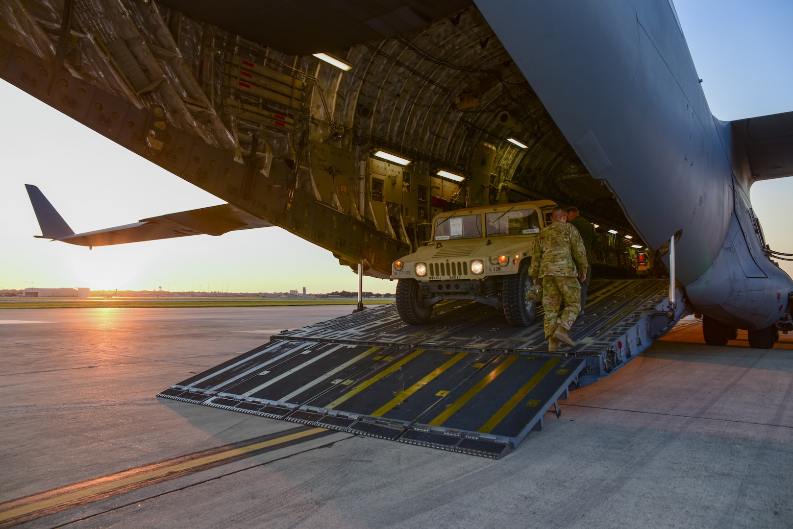 Members from the 502nd Logistics Readiness Squadron, the 433rd Airlift Wing, and the 445th Airlift Wing unload pallets and rolling stock containing maintenance equipment Aug. 30, 2017 at Joint Base San Antonio-Lackland Kelly Field, Texas.