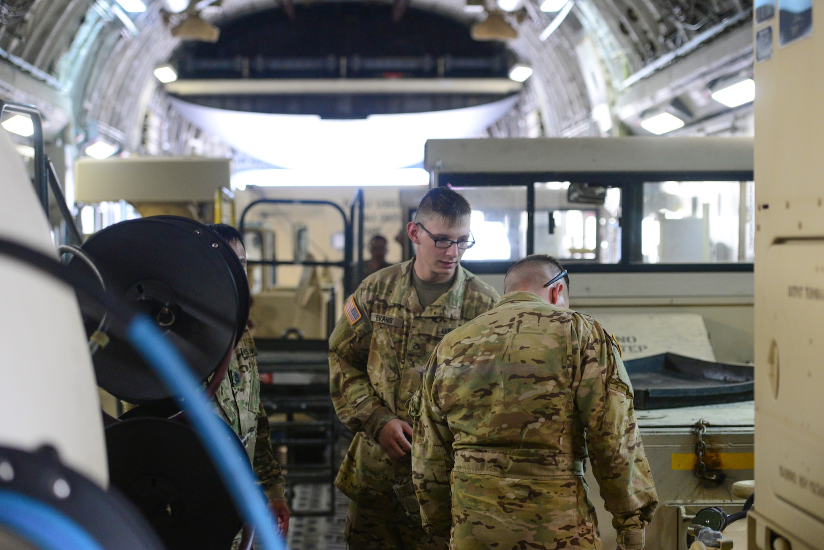 Members from the 502nd Logistics Readiness Squadron, the 433rd Airlift Wing, and the 445th Airlift Wing unload pallets and rolling stock containing maintenance equipment Aug. 30, 2017 at Joint Base San Antonio-Lackland Kelly Field, Texas.