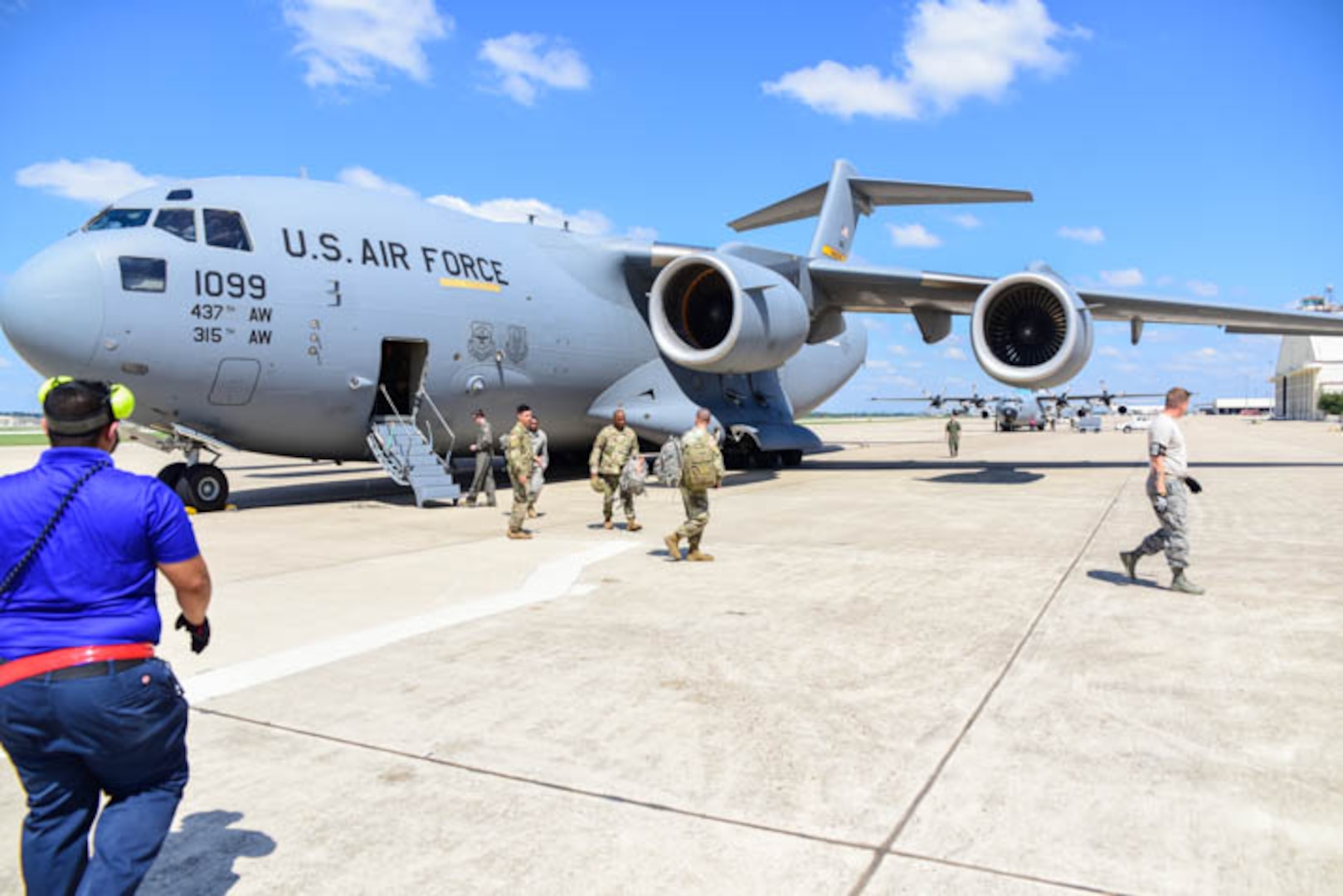 Soldiers from the 63rd Expeditionary Signal Battalion arrive with vehicles & equipment