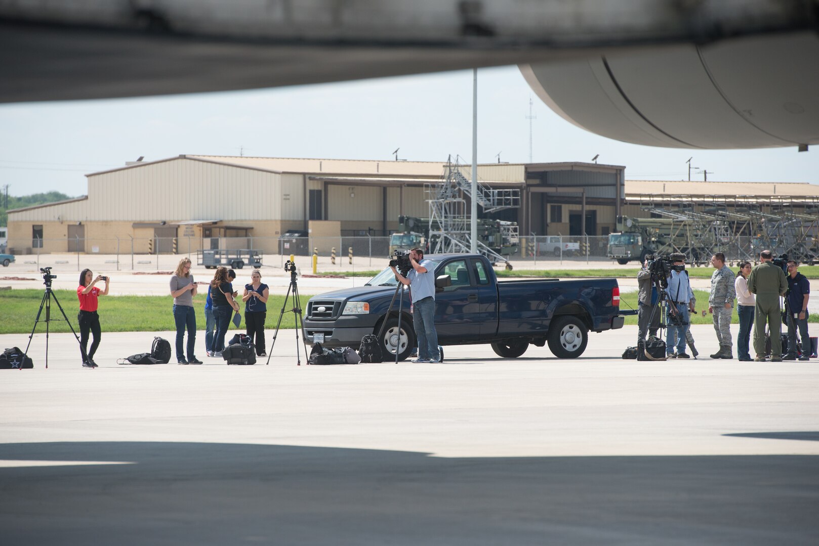 Members from the 502nd Logistics Readiness Squadron and the 433rd Airlift Wing load pallets containing medical supplies and equipment