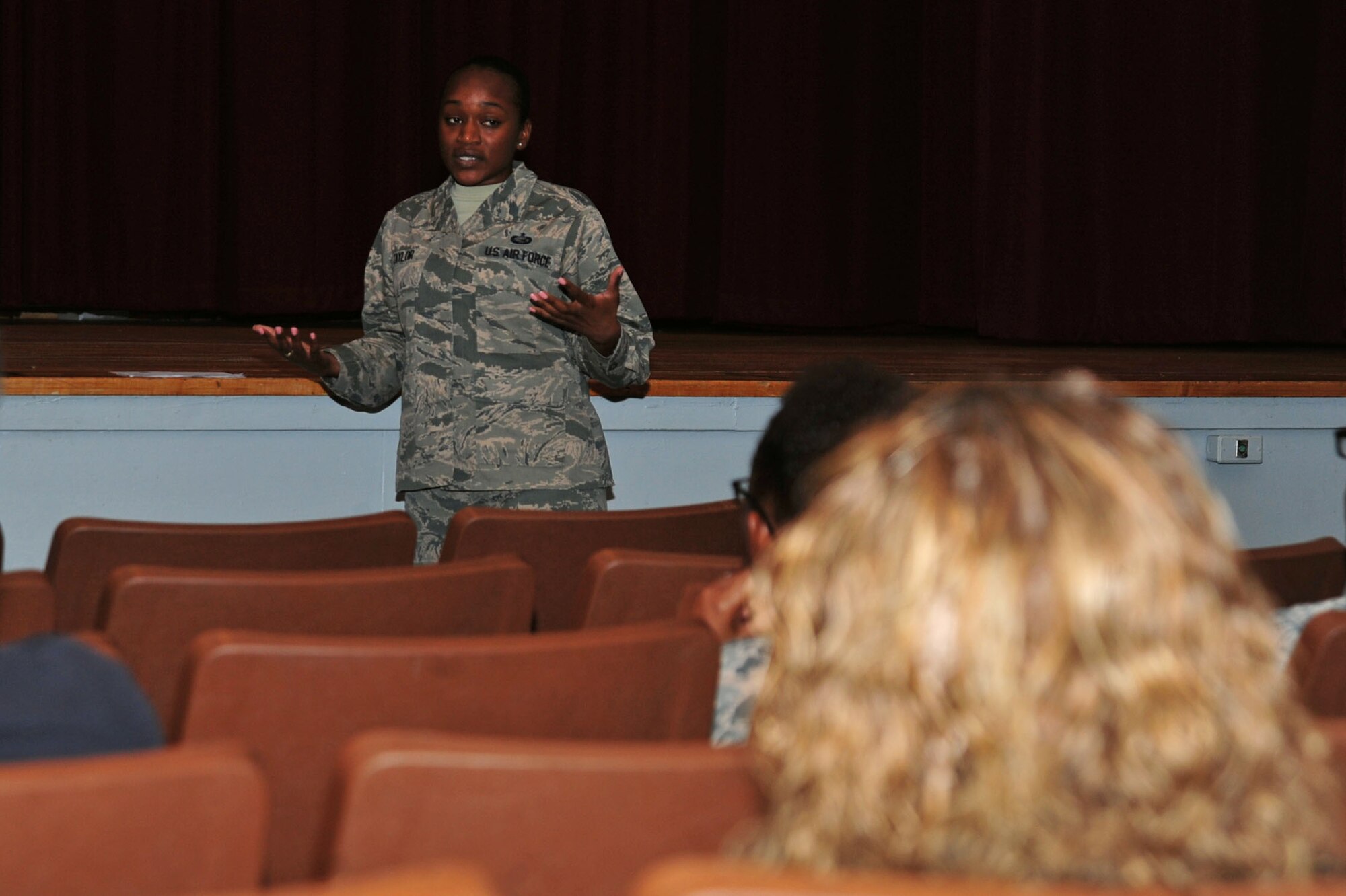 U.S. Air Force Staff Sgt. Brittany Taylor, 20th Force Support Squadron (FSS) noncommissioned officer in charge of outbound assignments, speaks to attendees during a Military Personnel Town Hall at Shaw Air Force Base, S.C., Aug. 31, 2017. Airmen assigned to the 20th FSS hosted the meeting to provided information regarding outbound assignments, high year of tenure extensions and enlisted professional military education. (U.S. Air Force photo by Airman 1st Class Kathryn R.C. Reaves)