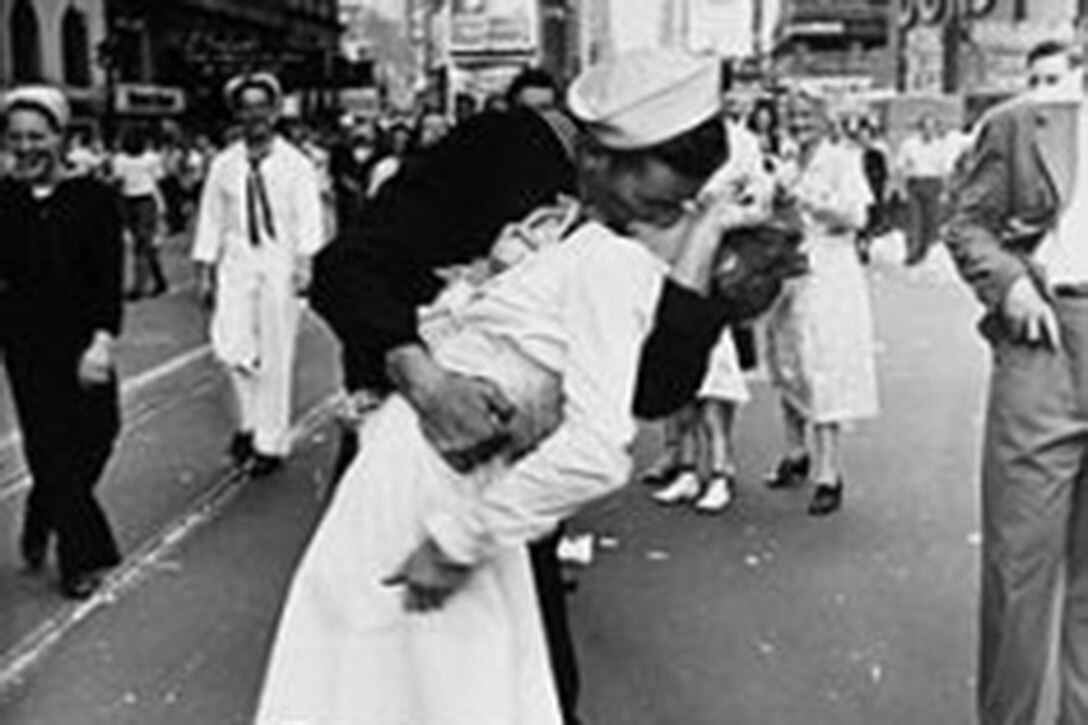 A sailor kisses a woman on VJ Day in New York City.