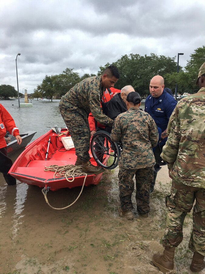 BEAUMONT, Texas - Marines with 4th Reconnaissance Battalion, 4th Marine Division, Marine Forces Reserve and joint integrated agencies conduct search and rescue operations in order to evacuate civilians from their homes and life-threatening conditions in Beaumont, Texas, Aug. 30, 2017. Marine Forces Reserve is providing Department of Defense support to FEMA, state and local response efforts due to Hurricane Harvey. (Courtesy photo/Released)