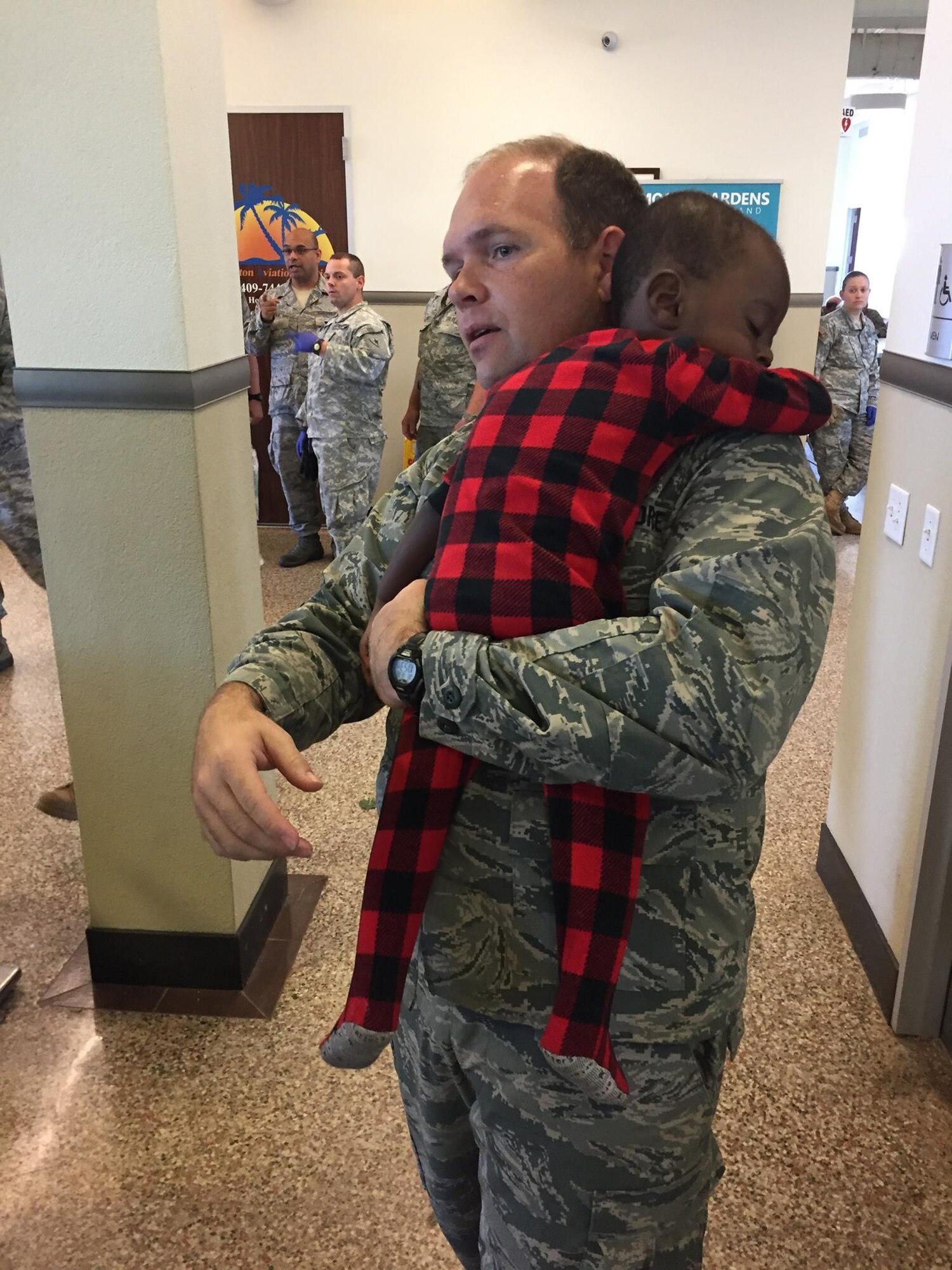 Airmen from the 136th Airlift Wing, Texas Air National Guard, airlift victims of Hurricane Harvey to safety and bring in supplies, personnel, and equipment into hard-hit areas, August 31, 2017.
Airmen from the wing's 136th Airlift Control Flight have been working around the clock airlifting 290 tons of cargo and 468 evacuees since first tasked on August 28. (U.S. Air National Guard courtesy photo)