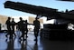 355th Equipment Maintenance Squadron crashed, damaged or disabled aircraft recovery team place a wing adapter onto pneumatic bags in order to airbag lift an A-10C Thunderbolt II at Davis-Monthan Air Force Base, Ariz., Aug. 28, 2017. The A-10’s wings are the primary lifting surfaces and the rear section of the aircraft is supported for stability. (U.S. Air Force photo by Senior Airman Mya M. Crosby)