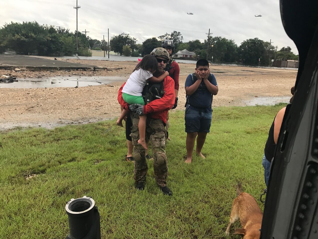 Rescue teams from the 920th Rescue Wing, Patrick Air Force Base, Florida, rescue stranded victims trapped by flooding from Hurricane Harvey Aug. 31, 2017 in Beaumont, Texas. The 920th RQW deployed roughly 90 Citizen Airmen, three Pave Hawks and two HC-130Ns in support of Air Force Northern’s search and rescue mission for FEMA disaster relief efforts. (U.S. Air Force photo/Tech. Sgt. Lindsey Maurice)