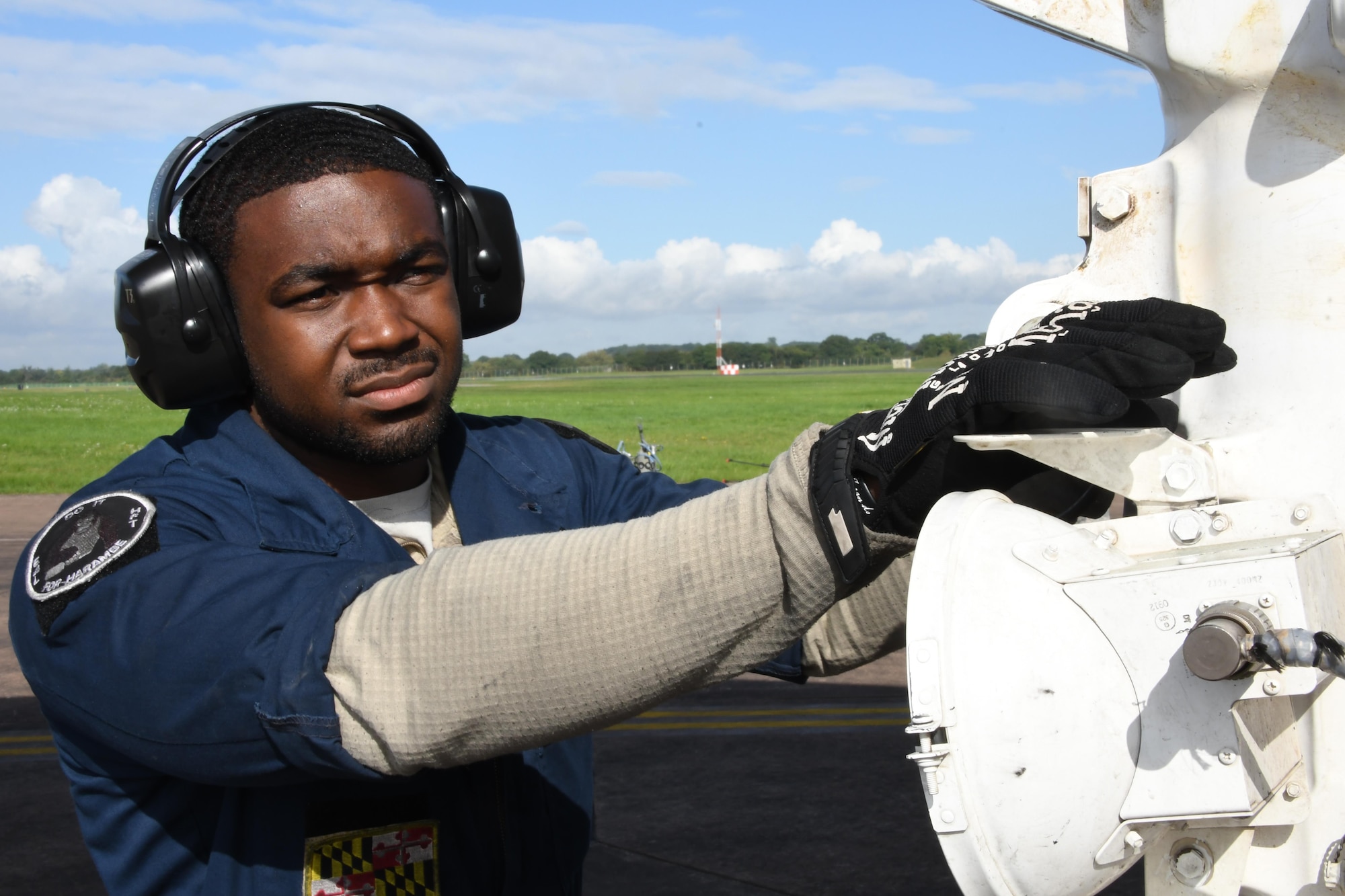 U.S. Air Force Staff Sgt. Ryan Branch, 489th Bomb Group crew chief, preps a B-1 Lancer for takeoff from RAF Fairford, U.K., Aug. 31, 2017.