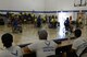 Volunteers for the Air Force Wounded Warrior Program keeps score during the 2017 Joint Adaptive Sports Camp wheelchair basketball games Aug. 29, 2017, at Joint Base Lewis-McChord, Wash.