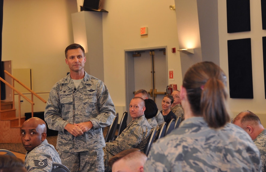 Col. Larry Broadwell, 9th Reconnaissance Wing commander, fields a question from an Airman during a town hall.