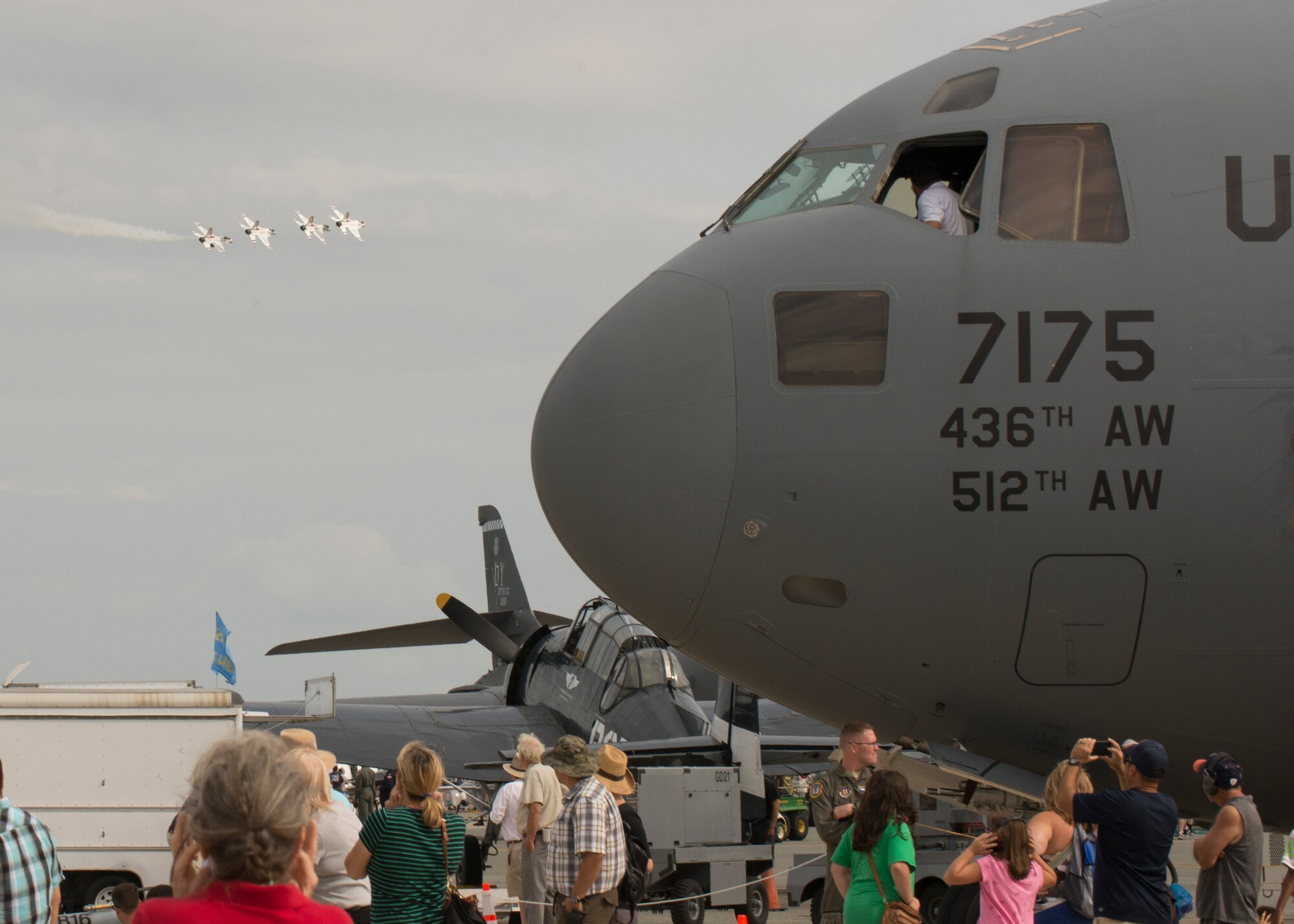 Team Dover guests watch the U.S. Air Force Thunderbirds during the 2017 Thunder Over Dover Open House Aug. 27, 2017, on Dover Air Force Base, Del. The Thunderbirds have performed for millions of fans since 1953, and are scheduled to complete nearly 70 performances this year. (U.S. Air Force photo by Staff Sgt. Jared Duhon)