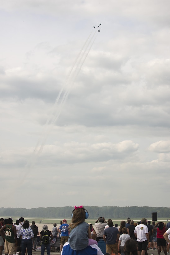 Team Dover guests watch the U.S. Air Force Thunderbirds during the 2017 Thunder Over Dover Open House Aug. 27, 2017, on Dover Air Force Base, Del. The Thunderbirds arrived two days prior to the 2017 Thunder Over Dover Open House and Airshow to meet media, base and community members and to practice performance routines. (U.S. Air Force photo by Staff Sgt. Jared Duhon)
