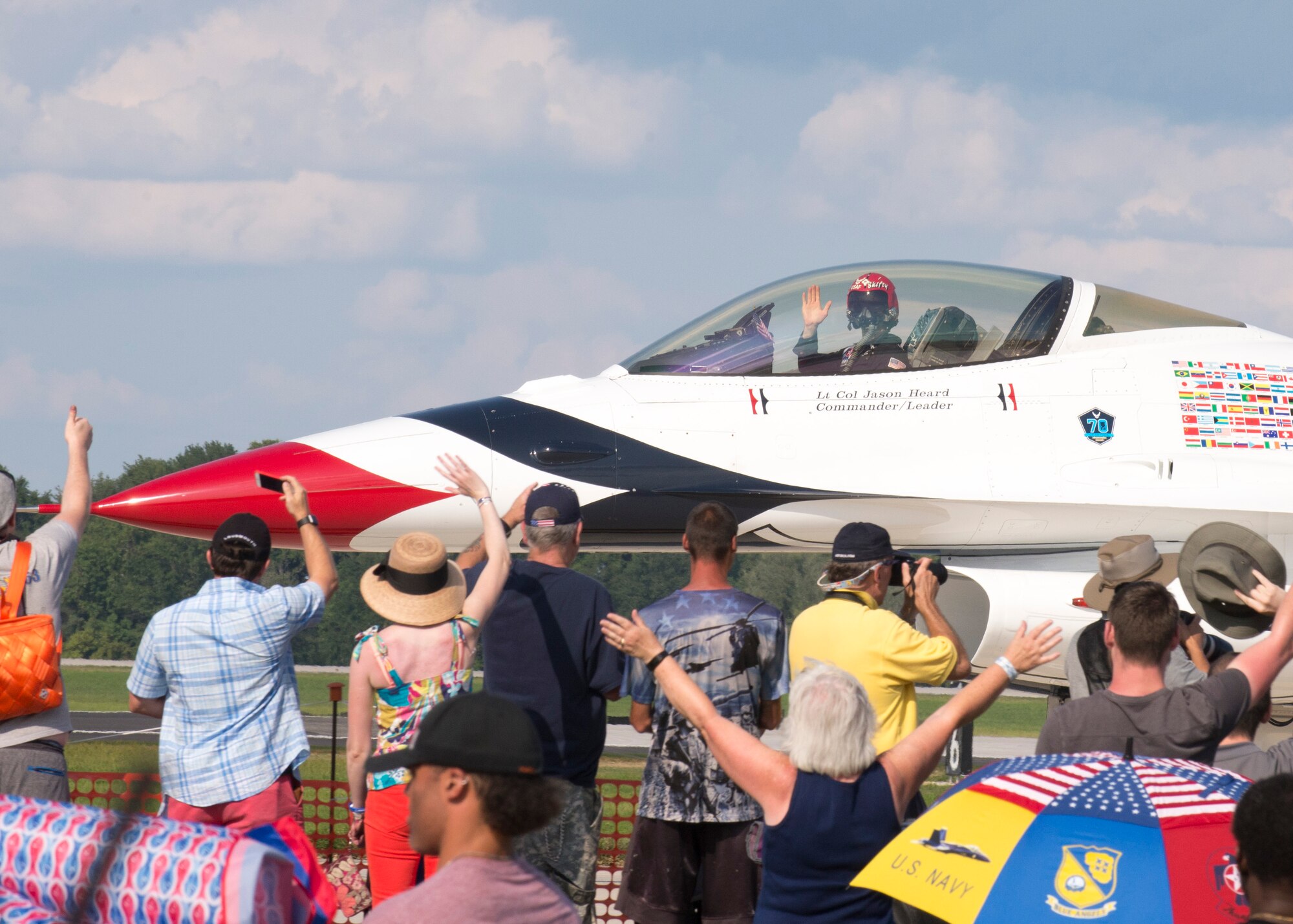 Number 1, Commander of the Thunderbirds, waves to the crowd after an aerial demonstration during the 2017 Thunder Over Dover Open House Aug. 26, 2017, on Dover Air Force Base, Del. The Thunderbirds are the Air Force’s premier aerial demonstration team, led by Lt. Col. Jason Heard, commander/leader of the U.S. Air Force Air Demonstration Squadron and pilot of the No. 1 jet. (U.S. Air Force photo by Staff Sgt. Jared Duhon)