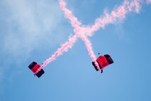 The Black Daggers sky dive during the opening ceremony of the Thunder Over Dover Open House and Airshow Aug. 25, 2017, at Dover Air Force Base, Del. The Black Daggers are the U.S. Army Special Operations Command’s Parachute Demonstration Team. (U.S. Air Force photo by Mauricio Campino