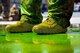 Chief Master Sgt. Brandon Broughman, 347th Rescue Group superintendent, stands in a puddle of sea dye he was drenched in after his final flight, Aug. 17, 2017, at Moody Air Force Base, Ga. Broughman concluded his 30-year career as a loadmaster on Sept. 1. During his tenure, he dedicated service to more than 5 variants of C-130’s in air mobility and tactical airlift support. (U.S. Air Force photo by Senior Airman Greg Nash)