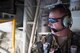 Chief Master Sgt. Brandon Broughman, 347th Rescue Group superintendent, views the back of an HC-130J Combat King II, during his final flight, Aug. 17, 2017, in coastal Florida. Broughman concluded his 30-year career as a loadmaster. During his tenure, he dedicated service to more than 5 variants of C-130’s in air mobility and tactical air drop support. (U.S. Air Force photo by Tech. Sgt. Timothy Gallagher)