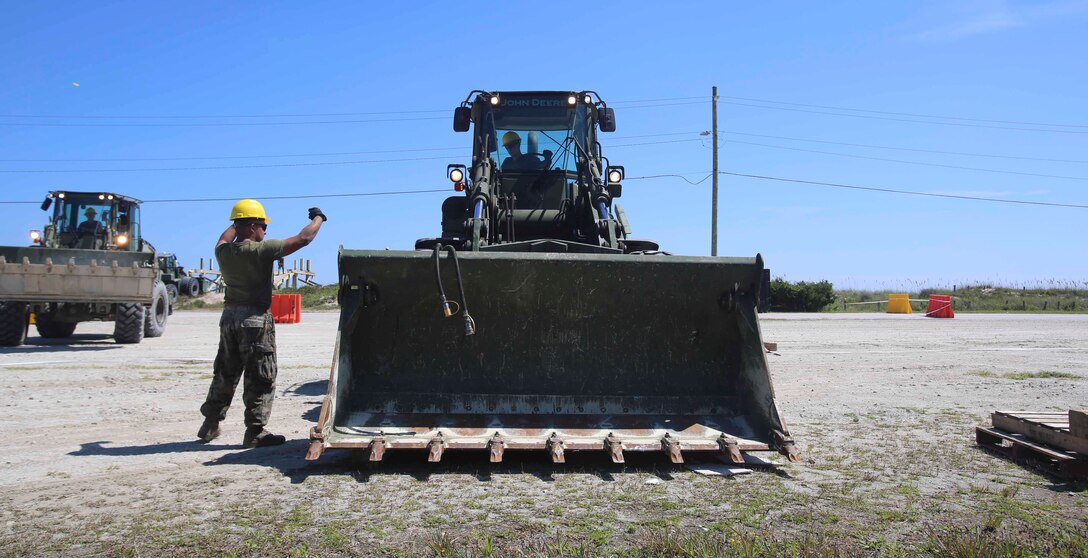 Marines with 8th Engineer Support Battalion destroy vacant beach houses at Onslow Beach, Camp Lejeune, N.C., Aug. 30