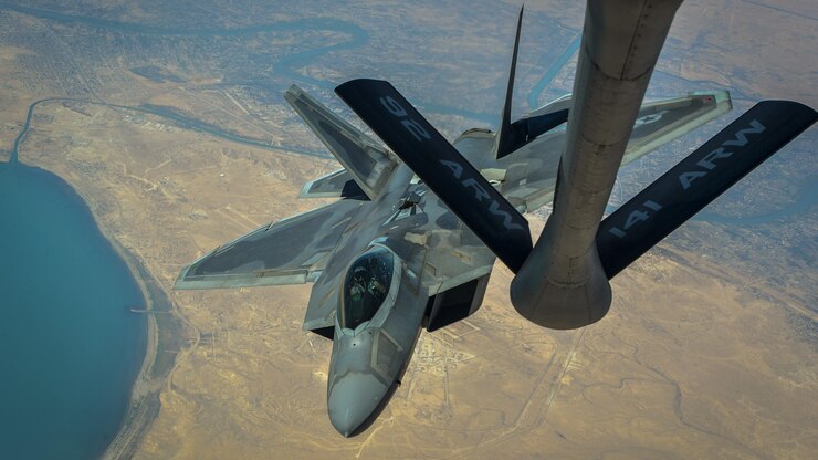 Airmen prepare to land an aircraft