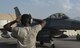 A maintainer marshals an F-16 Fighting Falcon into a parking spot on Bagram Airfield, Afghanistan, Aug. 31. The F-16 provides close-air-support and kinetic strikes, as well as overwatch for ground forces in Afghanistan. (U.S. Air Force photo by Staff Sgt. Benjamin Gonsier)