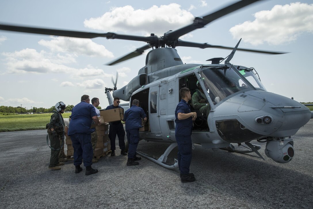 Marines with Marine Forces Reserve conduct an aerial re-supply in support of recovery efforts in the wake of Hurricane Harvey