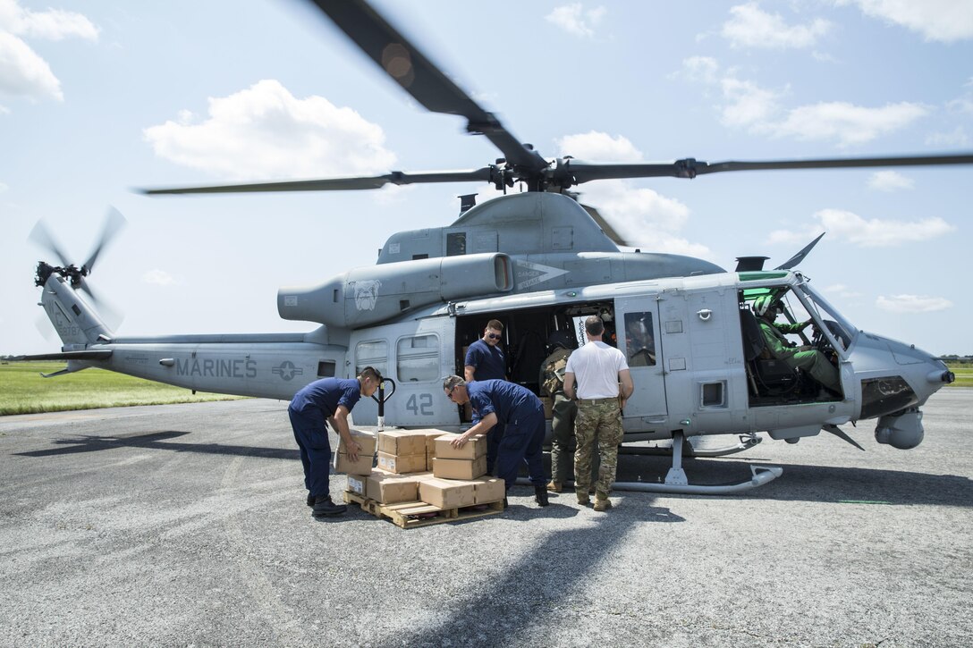 Marines with Marine Forces Reserve conduct an aerial re-supply in support of recovery efforts in the wake of Hurricane Harvey