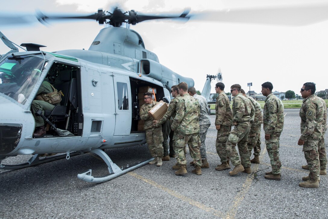 Marines with Marine Forces Reserve conduct an aerial re-supply in support of recovery efforts in the wake of Hurricane Harvey