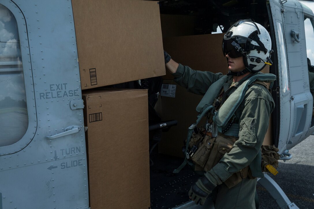 Marines with Marine Forces Reserve conduct an aerial re-supply in support of recovery efforts in the wake of Hurricane Harvey