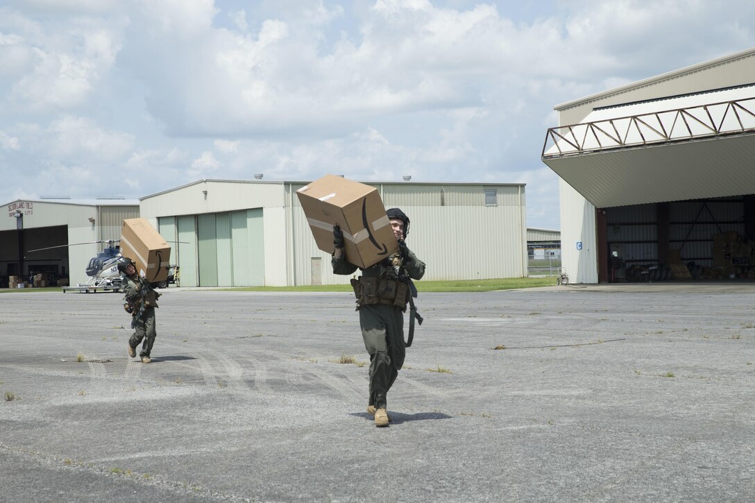 Marines with Marine Forces Reserve conduct an aerial re-supply in support of recovery efforts in the wake of Hurricane Harvey