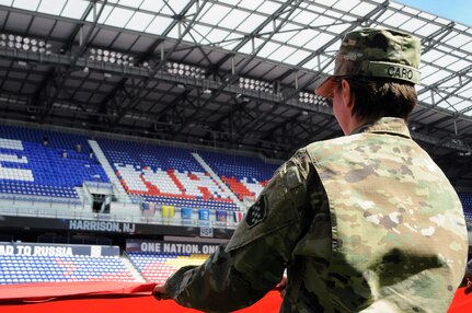 Master Sgt. Chanda Caro, assigned to the U.S. Army Reserve’s 99th Regional Support Command, headquartered at Joint Base McGuire-Dix-Lakehurst, New Jersey, practices holding the U.S. flag Sept. 1 prior to a military appreciation game with the United States men's national soccer team at Red Bull Arena in Harrison, New Jersey.  Service members from the Army and Air Force held the flag for the national anthem.