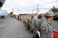 Service members from the Army and Air Force line up Sept. 1 to walk into Red Bull Arena in Harrison, New Jersey prior to a United States men's national soccer team game.  The service members were there to hold the U.S. flag for the national anthem as part of a military appreciation theme for the game.