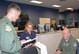 Col. Stephen Snelson, Deputy Director of Mobility Forces during Hurricane Harvey crisis-action team operations at the 601st Air Operation Center here, discusses aeromedical issues with Shomela Labee, Air Forces Northern Deputy Surgeon General, and Col. (Dr.) Bruce Woodford, AFNORTH Surgeon General. Snelson is deployed from Joint Base Lewis-McChord, where he is the vice commander of the 62nd Airlift Wing. Both personnel and logistical resources came from across the AFNORTH enterprise to assist Northern Command’s support of the Federal Emergency Management Agency’s response to Hurricane Harvey.  (Photo by Mary McHale)