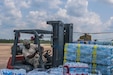 U.S. Army Reserve aviators from the 7th Battalion (General Support Aviation Battalion), 158th Aviation Regiment , stationed in Conroe, Texas and currently assigned to Task Force Iron Eagle, are conducting water re-supply missions to Beaumont. An anonymous billionaire donated three semi-trailers full of bottle water to relieve water shortages caused by Hurricane Harvey. (U.S. Army Reserve photo by Capt. Loyal Auterson/U.S. Army Reserve Command)(Released)