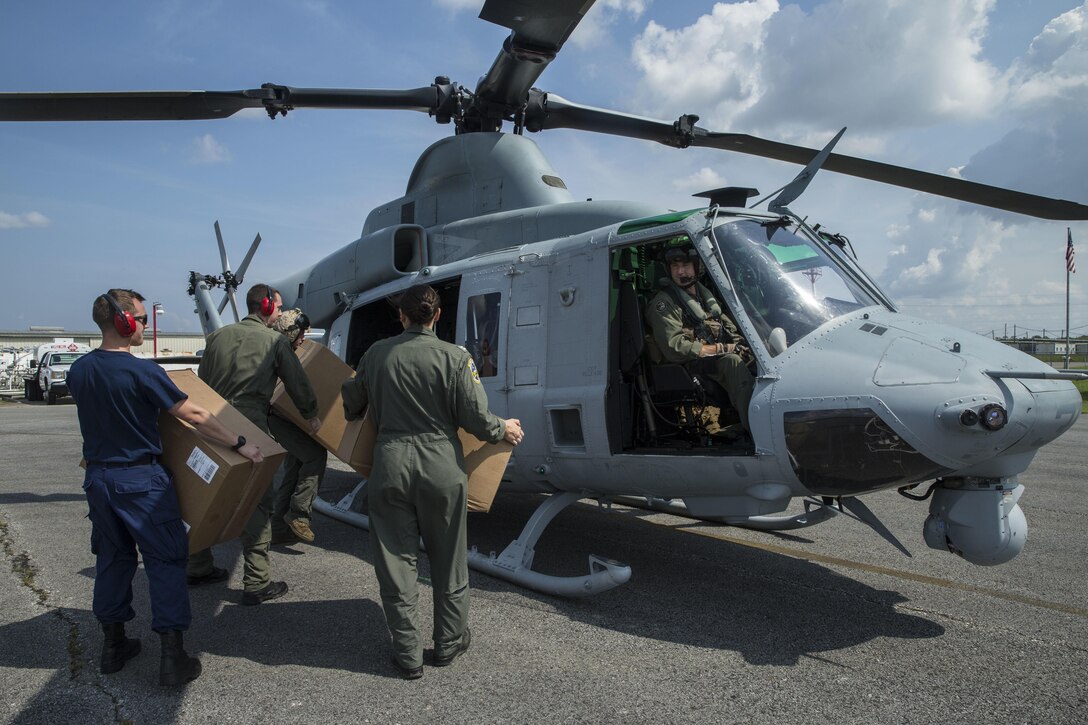 Marines with Marine Forces Reserve conduct an aerial re-supply in support of recovery efforts in the wake of Hurricane Harvey