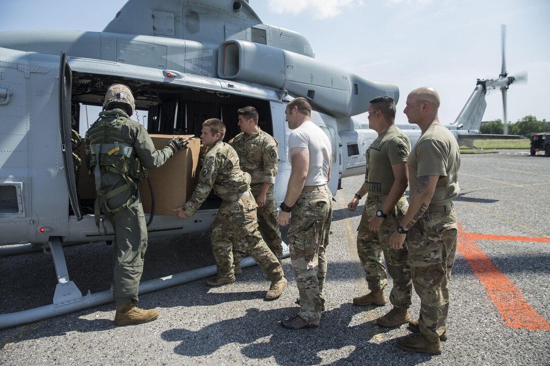 Marines with Marine Forces Reserve conduct an aerial re-supply in support of recovery efforts in the wake of Hurricane Harvey