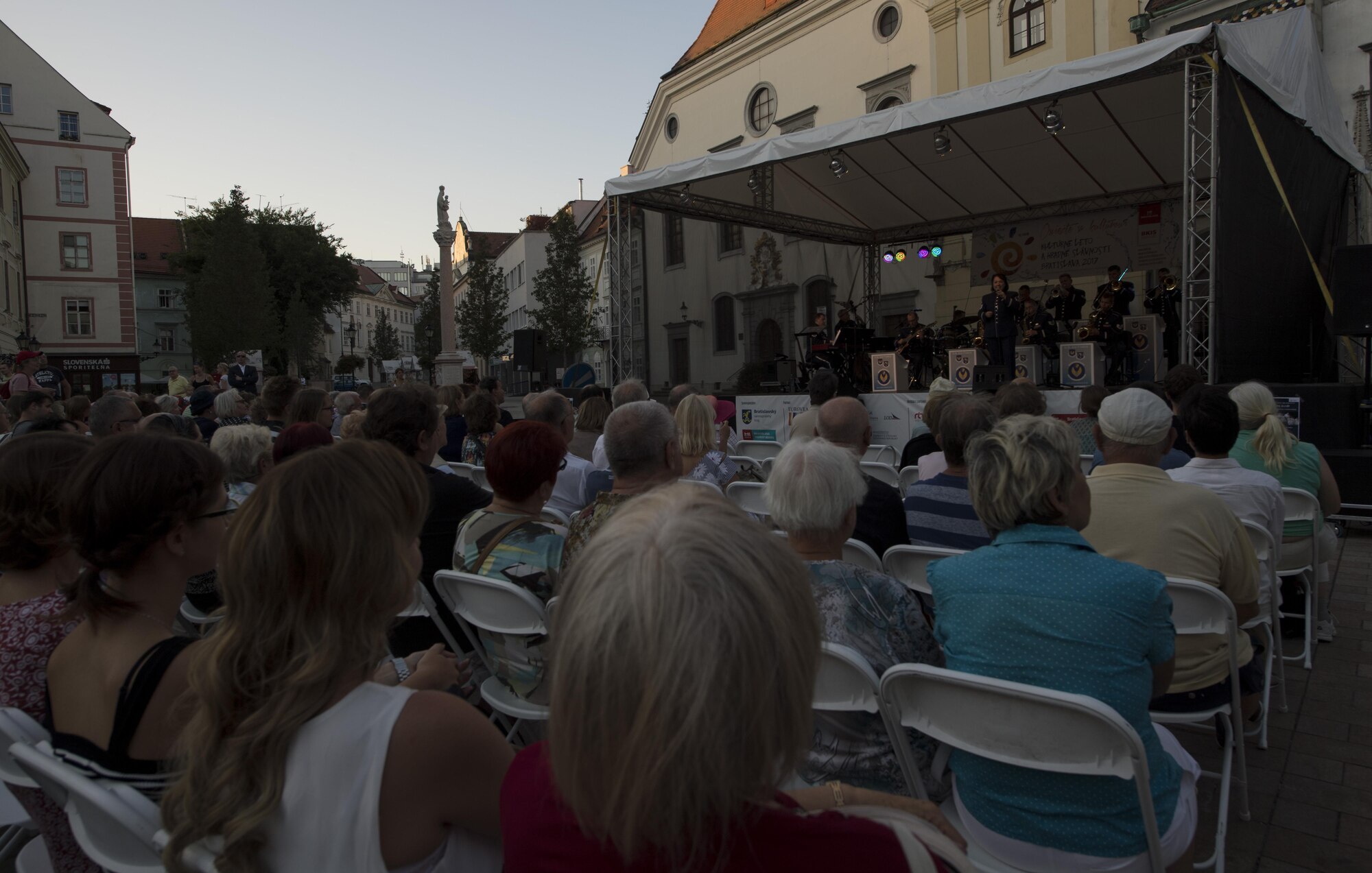 Members of The Ambassadors, U.S. Air Forces in Europe jazz band, perform before an audience for the 73rd anniversary of the Slovak National Uprising in Bratislava, Slovakia, Aug. 30, 2017. The band also played at the Museum of Slovak National Uprising in Banská Bystrica, Slovakia, for the celebration. The USAFE Band’s performance will help preserve the mutual commitment and trust between the U.S. and Slovakia. (U.S. Air Force photo by Senior Airman Tryphena Mayhugh)
