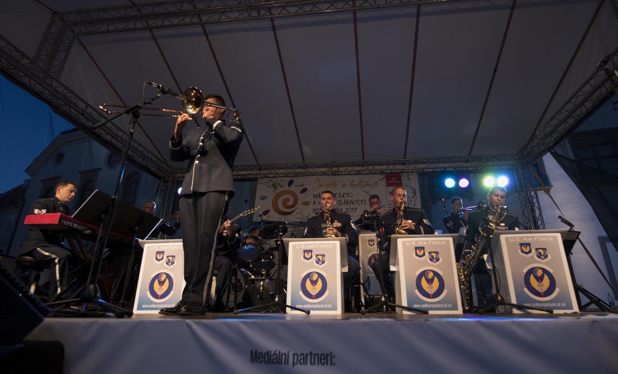 U.S. Air Force Staff Sgt. James Hubbard, U.S. Air Forces in Europe jazz band trombone, plays a solo during a concert for the 73rd anniversary of the Slovak National Uprising in Bratislava, Slovakia, Aug. 30, 2017. On Aug. 29, 1944, the Slovakian army started an uprising against the pro-Nazi government of the time. The USAFE band represents unique international musical heritage, building and preserving partnerships through official multi-national military and international community outreach events. (U.S. Air Force photo by Senior Airman Tryphena Mayhugh)