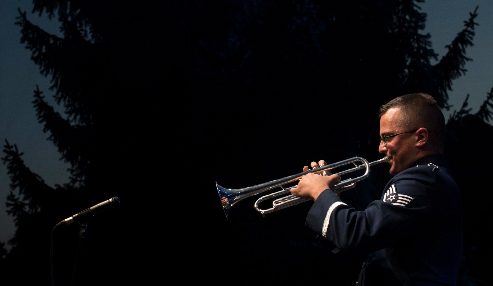 U.S. Air Force Staff Sgt. Nick Delvillano, U.S. Air Forces in Europe jazz band trumpet, plays a solo during the band’s performance for the 73rd anniversary of the Slovak National Uprising in Banská Bystrica, Slovakia, Aug. 29, 2017. The USAFE band, called the Ambassadors, serves to increase cultural ties and to enhance the people-to-people relationship between the U.S. and Slovakia. (U.S. Air Force photo by Senior Airman Tryphena Mayhugh)