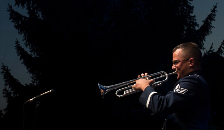 U.S. Air Force Staff Sgt. Nick Delvillano, U.S. Air Forces in Europe jazz band trumpet, plays a solo during the band’s performance for the 73rd anniversary of the Slovak National Uprising in Banská Bystrica, Slovakia, Aug. 29, 2017. The USAFE band, called the Ambassadors, serves to increase cultural ties and to enhance the people-to-people relationship between the U.S. and Slovakia. (U.S. Air Force photo by Senior Airman Tryphena Mayhugh)