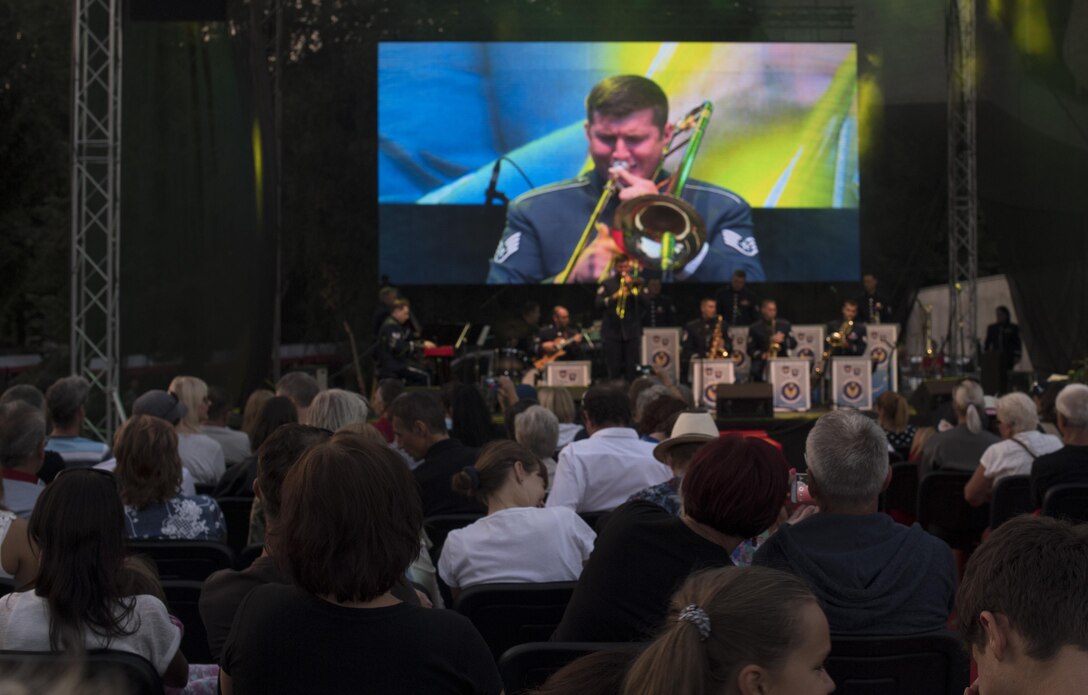 A crowd listens to the Ambassadors, the U.S. Air Forces in Europe jazz band, as they play music for the 73rd anniversary of the Slovak National Uprising in Banská Bystrica, Slovakia, Aug. 29, 2017. U.S. bands are invited each year to perform for the celebration. Participating in events with NATO allies improves interoperability and strengthens long standing relationships. (U.S. Air Force photo by Senior Airman Tryphena Mayhugh)