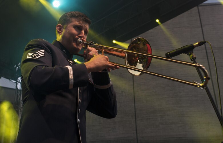 U.S. Air Force Staff Sgt. James Hubbard, U.S. Air Forces in Europe jazz band trombone, plays a solo during the 73rd anniversary of the Slovak National Uprising in Banská Bystrica, Slovakia, Aug. 29, 2017. The band was invited to perform for the event held at the Museum of Slovak National Uprising, as well as in the nation’s capital, Bratislava. The USAFE band serves to increase cultural ties and to enhance the people-to-people relationship between the U.S. and Slovakia. (U.S. Air Force photo by Senior Airman Tryphena Mayhugh)