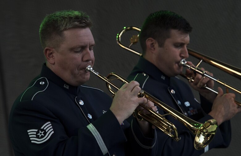 U.S. Air Force Tech. Sgt. Jeffrey Reich, U.S. Air Forces in Europe jazz band trumpet, performs alongside members of the band for the 73rd anniversary of the Slovak National Uprising in Banská Bystrica, Slovakia, Aug. 29, 2017. The USAFE Band’s performance will help preserve the mutual commitment and trust between the U.S. and Slovakia. (U.S. Air Force photo by Senior Airman Tryphena Mayhugh)