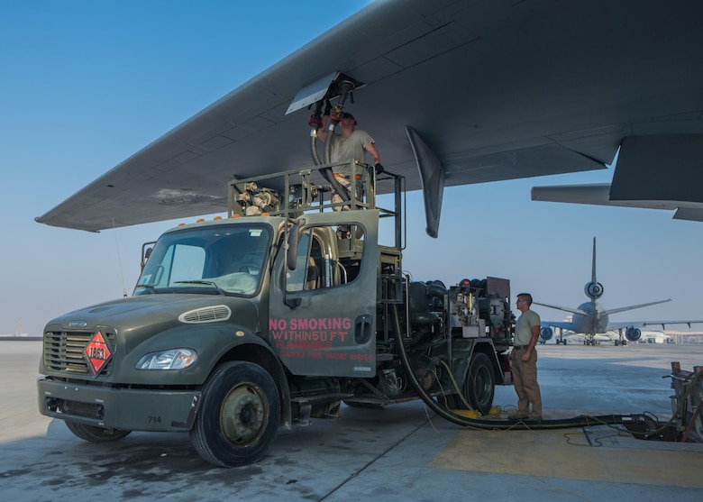 Airman First Class Joshua Gill, left, 380th KC-10 Extender Aircraft Maintenance Unit crew chief, and Senior Airman Ross Karrick, 380th Expeditionary Logistics Readiness Squadron distribution technician, fuel a KC-10 Extender Aug. 4, 2017, at Al Dhafra Air Base, United Arab Emirates.