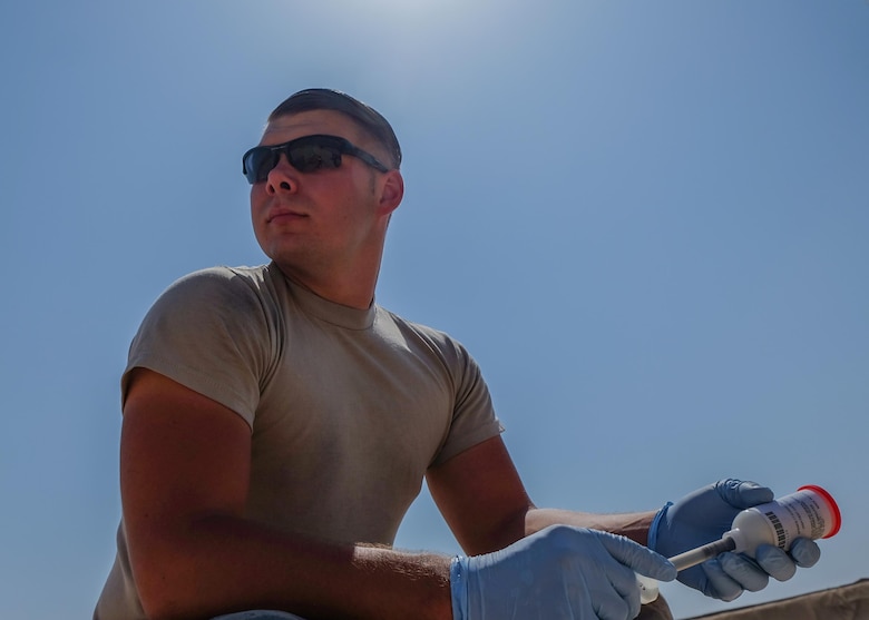 Airman First Class Steven Newberry, 380th Expeditionary Logistics Readiness Squadron fuels management technician, mixes sealant Aug. 4, 2017, at Al Dhafra Air Base, United Arab Emirates.