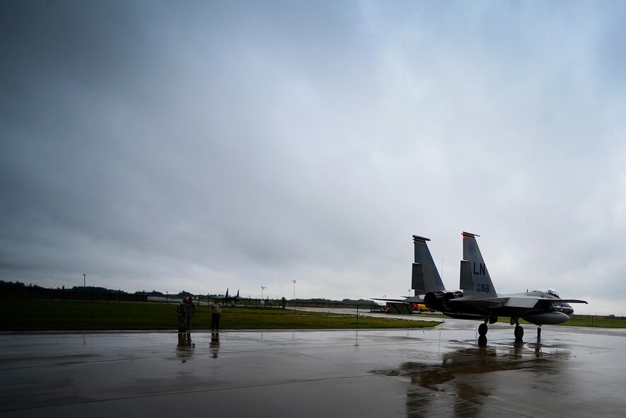 Alert F-15Cs from the 493rd Expeditionary Fighter Squadron respond to an alert scramble notification at Siauliai Air Base, Lithuania, Sept. 4, 2017. The F-15C is uniquely suited for the Baltic Air Policing mission with its capability to detect, acquire, track and intercept opposing aircraft while operating in friendly or rival-controlled airspace at distances beyond visual range down to close range, and at altitudes down to treetop level. (U.S. Air Force photo/ Tech. Sgt. Matthew Plew)