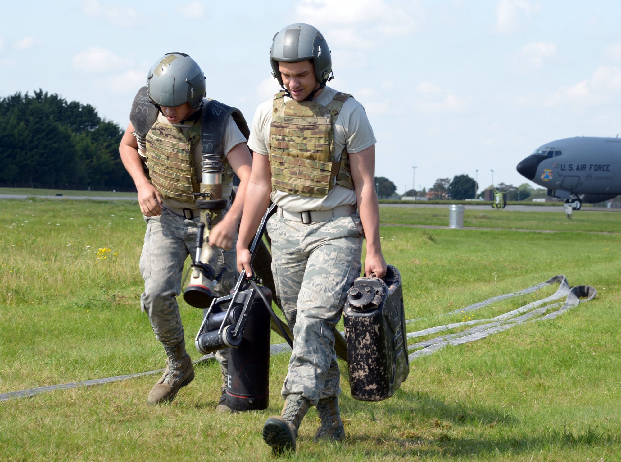 Airmen have foot race while carrying equipment